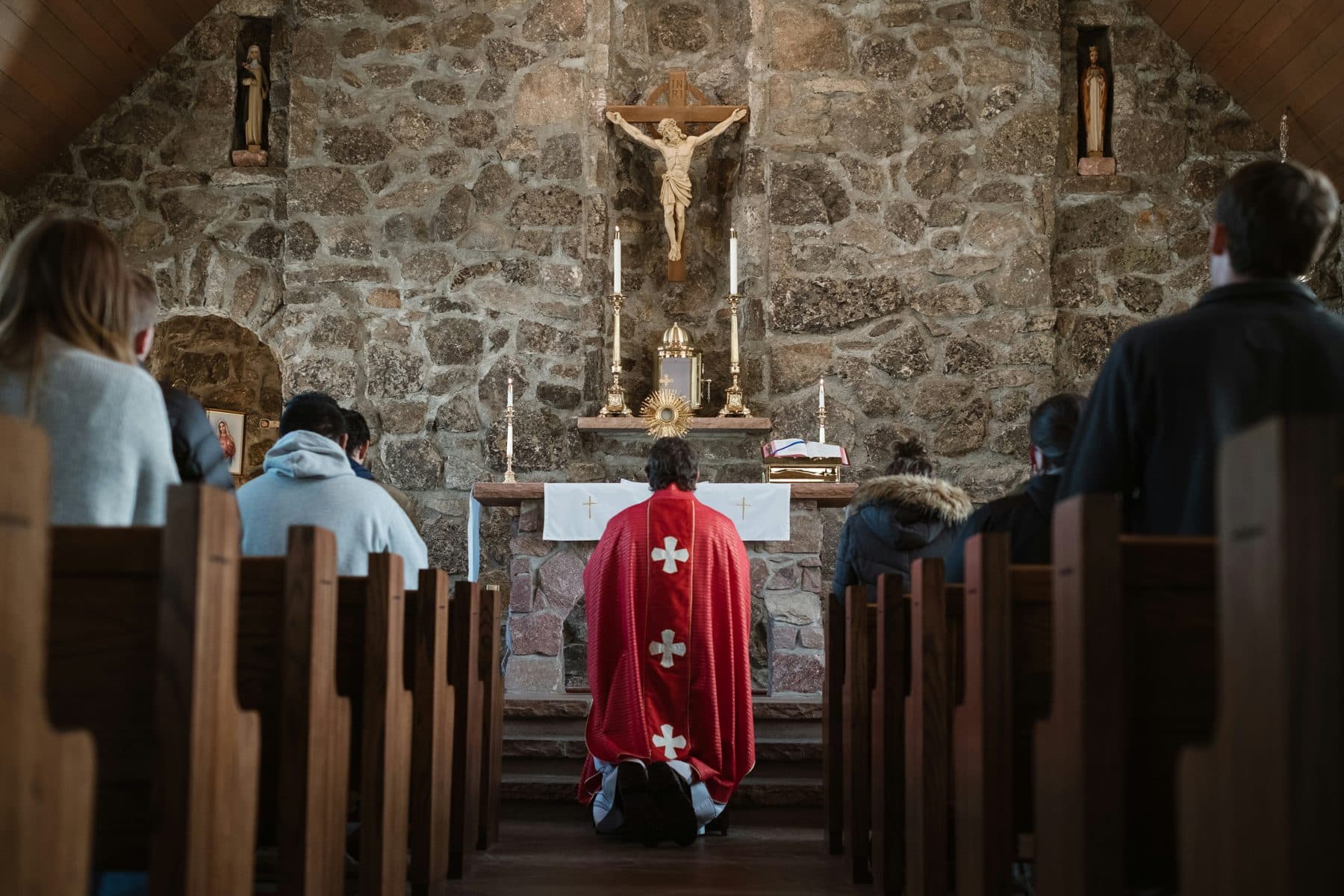 A priest celebrating Mass at the altar
